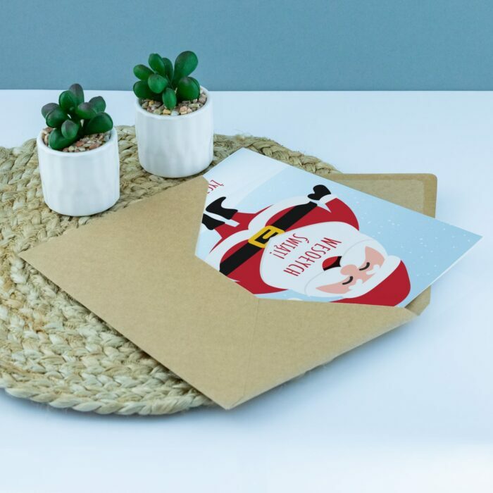 Kartka z Mikołajem w kopercie.